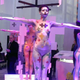 Illustration for article titled These Naked Women Were Selling Phones or Something at CES